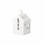 Photophores maisons en porcelaine blanche avec décorations de Noël - Collection Santa de Räder Design
